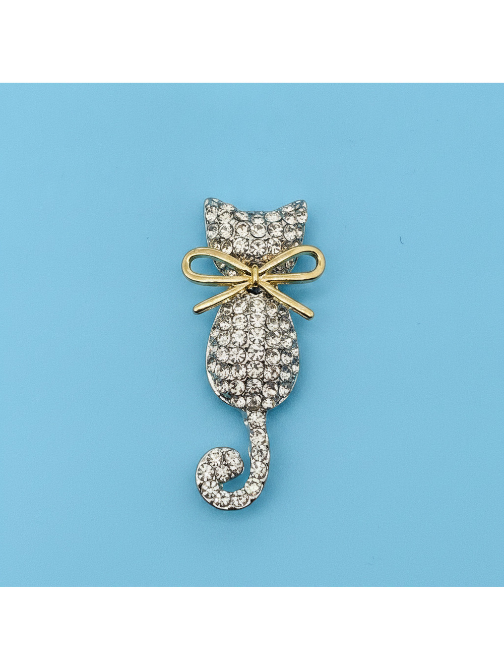 Cat-Shaped Rhinestone Brooch with Gold Bow Accent
